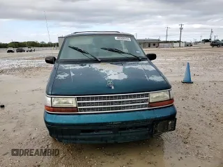 1994 Plymouth Voyager z VIN 2P4GH2530RR635286, wystawiony jako Copart lot #80988944 z przebiegiem 175 646 mil mil oraz Szkody całkowita. Historia ofert i sprzedaży dostępna na DreamBid. Obrazek 12.
