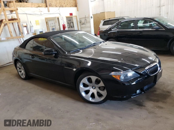 2004 BMW 6 Series 645Ci z VIN WBAEK73414B321589, wystawiony jako Copart lot #54207984 z przebiegiem 127 936 mil mil oraz Szkoda całkowita • Salvage title. Historia ofert i sprzedaży dostępna na DreamBid. Obrazek 4.