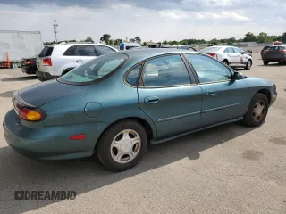 1997 Ford Taurus GL with VIN 1FALP52U4VA323402, listed as a Copart auction lot 65742235 with 43,415 mi miles and Clean title. Bid and sale history available at DreamBid. Image 3.