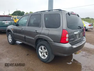 2005 Mazda Tribute S with VIN 4F2YZ04135KM05678, listed as a IAAI auction lot 42194083 with 283,488 mi miles and . Bid and sale history available at carsss.com. Image 3.