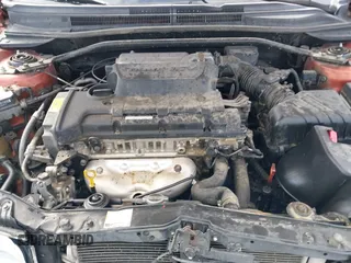 2007 Kia Spectra with VIN KNAFE161275003137, listed as a IAAI auction lot 41697530 with 256,834 mi miles. Bid and sale history available at carsss.com. Image 10.