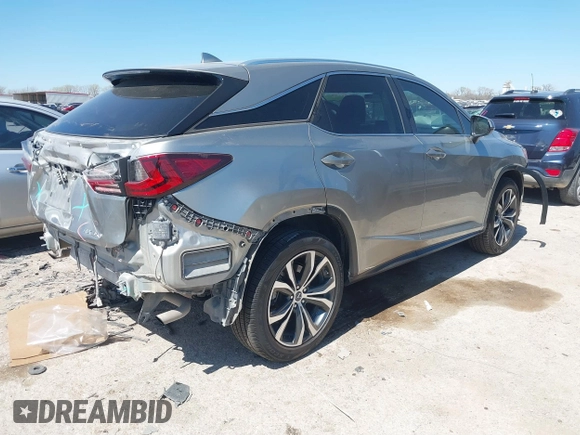 2020 Lexus RX 350 with VIN 2T2HZMAA3LC168454, listed as a IAAI auction lot 41822626 with 91,096 mi miles and . Bid and sale history available at DreamBid. Image 4.