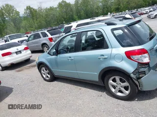 2009 Suzuki SX4 Touring AWD z VIN JS2YB417096201672, wystawiony jako IAAI lot #42209018 z przebiegiem 64 879 mil mil oraz . Historia ofert i sprzedaży dostępna na DreamBid. Obrazek 15.