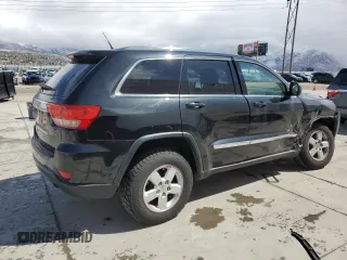 2012 Jeep Grand Cherokee Laredo with VIN 1C4RJFAG7CC347038, listed as a Copart auction lot 51181285 with 159,291 mi miles and Salvage Title. Bid and sale history available at carsss.com. Image 3.