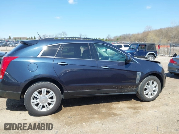 2015 Cadillac SRX with VIN 3GYFNAE39FS571065, listed as a IAAI auction lot 42029749 with 146,098 mi miles and . Bid and sale history available at DreamBid. Image 13.