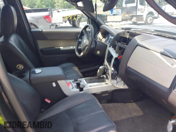 2011 Mercury Mariner Premier with VIN 4M2CN9HG4BKJ00186, listed as a IAAI auction lot 42840165 with 149,700 mi miles and . Bid and sale history available at DreamBid. Image 5.