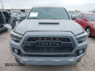 2021 Toyota Tacoma 4WD SR5 with VIN 3TMDZ5BN5MM116584, listed as a IAAI auction lot 41548175 with 23,031 mi miles. Bid and sale history available at carsss.com. Image 12.