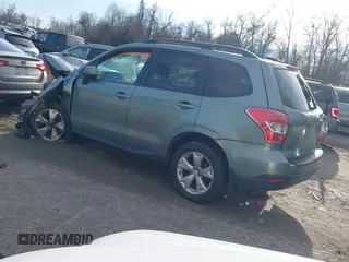 2014 Subaru Forester Premium with VIN JF2SJAEC4EH450081, listed as a IAAI auction lot 41134306 with Not Provided miles and . Bid and sale history available at DreamBid. Image 3.