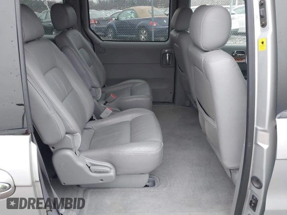 2004 Kia Sedona LX with VIN KNDUP131546535352, listed as a IAAI auction lot 41856784 with 128,943 mi miles. Bid and sale history available at carsss.com. Image 8.