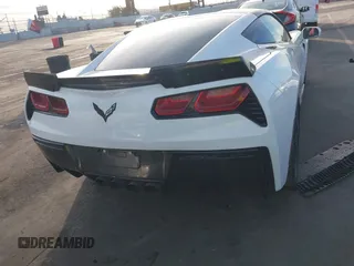2015 Chevrolet Corvette 1LT z VIN 1G1YB2D72F5124033, wystawiony jako IAAI lot #41396693 z przebiegiem 26 056 mil mil oraz . Historia ofert i sprzedaży dostępna na DreamBid. Obrazek 16.
