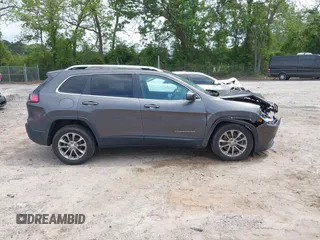 2019 Jeep Cherokee Latitude Plus with VIN 1C4PJLLBXKD305219, listed as a IAAI auction lot 42150283 with 89,000 mi miles and . Bid and sale history available at DreamBid. Image 13.