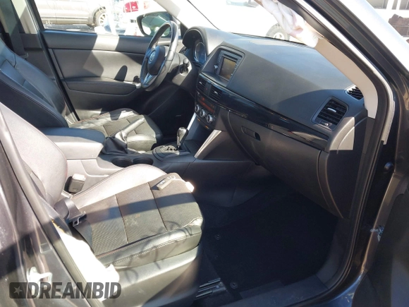 2014 Mazda CX-5 Grand Touring with VIN JM3KE4DY4E0320695, listed as a IAAI auction lot 41989350 with 169,391 mi miles and . Bid and sale history available at DreamBid. Image 5.