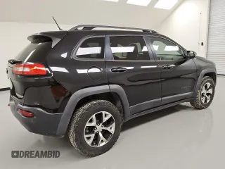 2015 Jeep Cherokee Trailhawk with VIN 1C4PJMBSXFW746138, listed as a Copart auction lot 49877985 with 86,820 mi miles and Clean Title. Bid and sale history available at carsss.com. Image 3.