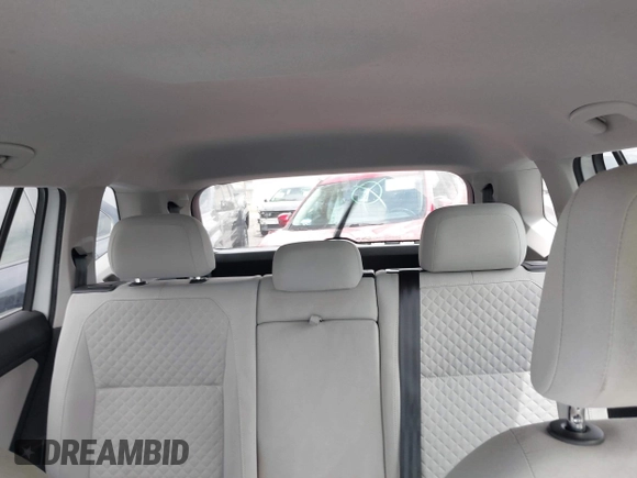 2018 Volkswagen Tiguan S with VIN 3VV1B7AX8JM032990, listed as a IAAI auction lot 42279807 with 74,185 mi miles and . Bid and sale history available at DreamBid. Image 21.