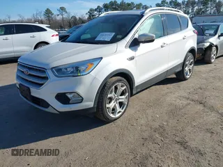2019 Ford Escape Titanium with VIN 1FMCU9J91KUB21842, listed as a IAAI auction lot 41632210 with 104,900 mi miles. Bid and sale history available at carsss.com. Image 17.