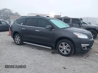 2015 Chevrolet Traverse LT z VIN 1GNKRHKD6FJ370974, wystawiony jako IAAI lot #41533141 z przebiegiem 71 679 mil mil oraz . Historia ofert i sprzedaży dostępna na DreamBid. Obrazek 1.
