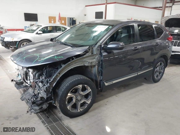 2019 Honda CR-V EX-L with VIN 2HKRW2H87KH638196, listed as a IAAI auction lot 41763821 with 89,994 mi miles. Bid and sale history available at carsss.com. Image 2.