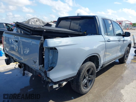 2023 Honda Ridgeline Black Edition z VIN 5FPYK3F83PB022931, wystawiony jako IAAI lot #42105410 z przebiegiem 42 807 mil mil oraz . Historia ofert i sprzedaży dostępna na DreamBid. Obrazek 4.