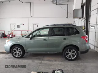 2015 Subaru Forester Touring with VIN JF2SJAUC5FH518262, listed as a IAAI auction lot 42789542 with 182,869 mi miles and . Bid and sale history available at DreamBid. Image 14.