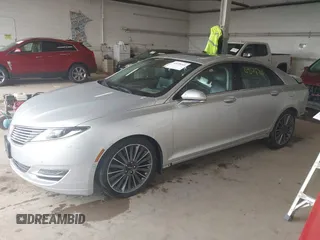 2016 Lincoln MKZ Hybrid z VIN 3LN6L2LU5GR608372, wystawiony jako IAAI lot #42078341 z przebiegiem 141 887 mil mil oraz . Historia ofert i sprzedaży dostępna na DreamBid. Obrazek 2.