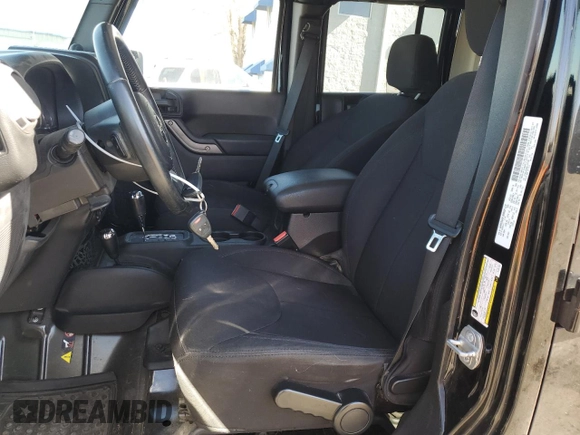 2014 Jeep Wrangler Unlimited Sport with VIN 1C4BJWDG8EL207287, listed as a Copart auction lot 49522335 with 67,472 mi miles and Salvage Title. Bid and sale history available at carsss.com. Image 7.