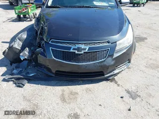 2014 Chevrolet Cruze LS with VIN 1G1PA5SH1E7181211, listed as a IAAI auction lot 41850676 with 128,893 mi miles. Bid and sale history available at carsss.com. Image 6.