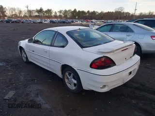 1999 Pontiac Grand Am GT with VIN 1G2NW12E3XM830305, listed as a IAAI auction lot 41797278 with 87,537 mi miles. Bid and sale history available at carsss.com. Image 3.