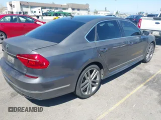 2016 Volkswagen Passat 1.8T S with VIN 1VWAT7A36GC060108, listed as a IAAI auction lot 41985291 with 108,196 mi miles. Bid and sale history available at carsss.com. Image 4.