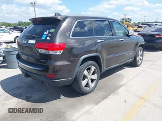 2016 Jeep Grand Cherokee Limited 75th Anniversary with VIN 1C4RJFBG0GC492720, listed as a IAAI auction lot 42073930 with 119,539 mi miles and . Bid and sale history available at DreamBid. Image 4.