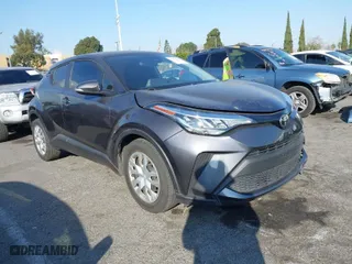 2021 Toyota C-HR LE with VIN JTNKHMBX6M1098630, listed as a IAAI auction lot 41451015 with 67,426 mi miles. Bid and sale history available at carsss.com. Image 1.