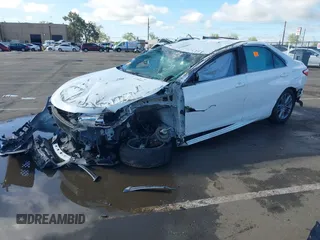 2015 Toyota Camry XLE z VIN 4T1BF1FK7FU110031, wystawiony jako IAAI lot #41906811 z przebiegiem Nie podano mil oraz . Historia ofert i sprzedaży dostępna na DreamBid. Obrazek 18.