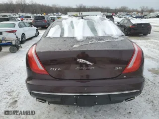 2017 Jaguar XJ with VIN SAJWA2G77H8W10384, listed as a Copart auction lot 45474205 with 63,680 mi miles and Salvage Title. Bid and sale history available at carsss.com. Image 6.