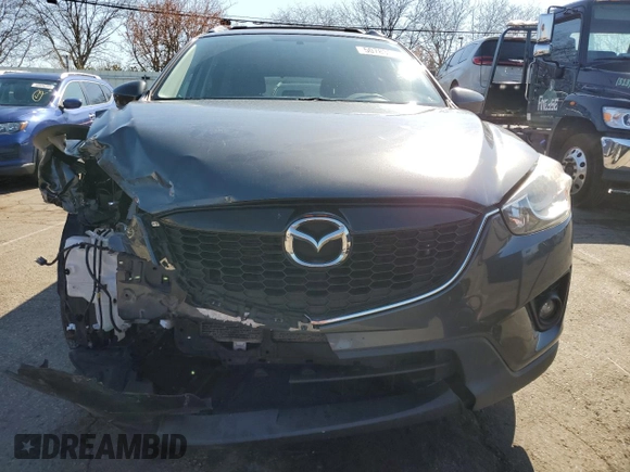 2014 Mazda CX-5 Touring with VIN JM3KE2CY7E0366690, listed as a Copart auction lot 50783635 with 127,853 mi miles and Salvage Title. Bid and sale history available at carsss.com. Image 5.
