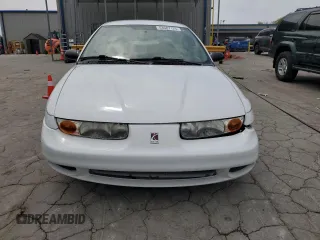 2002 Saturn SL z VIN 1G8ZH52842Z136222, wystawiony jako Copart lot #53687125 z przebiegiem 133 327 mil mil oraz Szkoda całkowita • Salvage title. Historia ofert i sprzedaży dostępna na DreamBid. Obrazek 5.