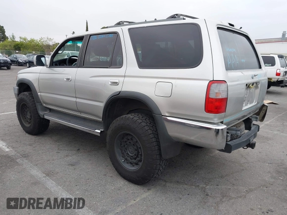 2000 Toyota 4Runner SR5 z VIN JT3HN86R9Y0288531, wystawiony jako IAAI lot #42157270 z przebiegiem 298 630 mil mil oraz . Historia ofert i sprzedaży dostępna na DreamBid. Obrazek 3.