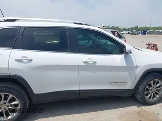 2019 Jeep Cherokee Latitude Plus with VIN 1C4PJLLBXKD220221, listed as a IAAI auction lot 42060125 with 89,452 mi miles and . Bid and sale history available at DreamBid. Image 13.