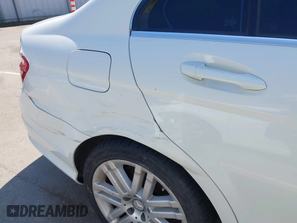 2009 Mercedes-Benz C-Class 3.0L Sport with VIN WDDGF54X09F233877, listed as a IAAI auction lot 42121123 with 215,698 mi miles. Bid and sale history available at carsss.com. Image 11.