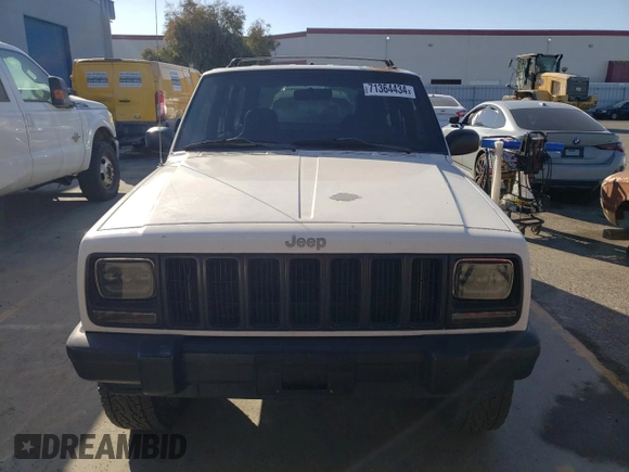 2000 Jeep Cherokee SE with VIN 1J4FF28S5YL243656, listed as a Copart auction lot 71364434 with 222,032 mi miles and Salvage Title. Bid and sale history available at carsss.com. Image 5.