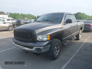 2004 Dodge 1500 SLT with VIN 1D7HU18N14J107934, listed as a IAAI auction lot 42099925 with 237,021 mi miles. Bid and sale history available at carsss.com. Image 2.