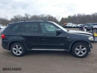 2009 BMW X5 30i with VIN 5UXFE43579L037535, listed as a IAAI auction lot 41715317 with 210,697 mi miles. Bid and sale history available at carsss.com. Image 13.