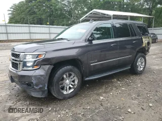 2018 Chevrolet Tahoe LT with VIN 1GNSKBKC8JR268689, listed as a Copart auction lot 58199955 with 131,906 mi miles and Salvage title. Bid and sale history available at DreamBid. Image 1.