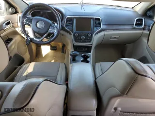 2014 Jeep Grand Cherokee Overland with VIN 1C4RJFCT8EC409673, listed as a Copart auction lot 45271555 with 136,810 mi miles and Salvage Title. Bid and sale history available at carsss.com. Image 8.