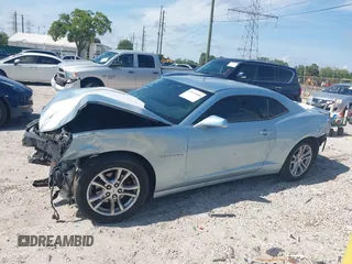 2015 Chevrolet Camaro LS z VIN 2G1FB1E30F9286632, wystawiony jako IAAI lot #41933048 z przebiegiem 164 493 mil mil oraz . Historia ofert i sprzedaży dostępna na DreamBid. Obrazek 13.