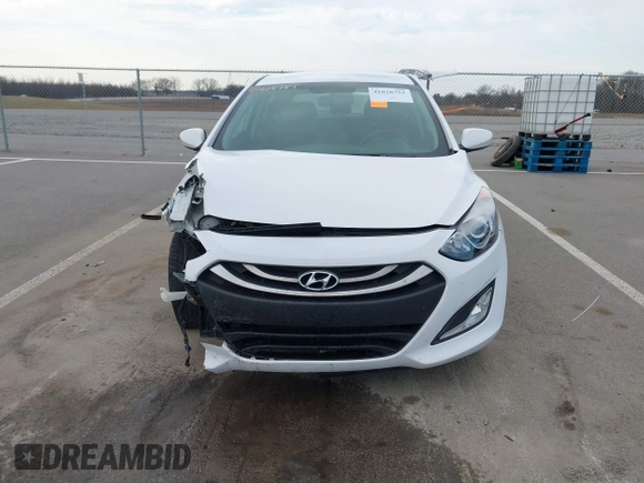 2013 Hyundai Elantra GT with VIN KMHD35LE1DU145894, listed as a IAAI auction lot 41828751 with 90,529 mi miles. Bid and sale history available at carsss.com. Image 12.