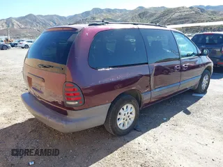 2000 Plymouth Voyager Grand SE z VIN 1P4GP44G8YB513887, wystawiony jako IAAI lot #41515488 z przebiegiem 330 867 mil mil oraz . Historia ofert i sprzedaży dostępna na DreamBid. Obrazek 4.
