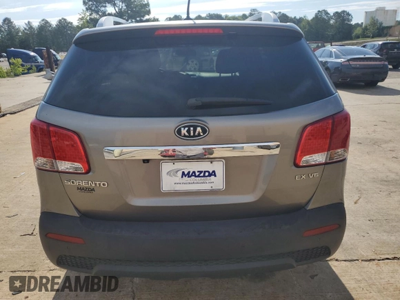 2013 Kia Sorento EX с VIN 5XYKUDA22DG365462, выставлен на аукционе Copart как лот 56941515 с пробегом 177 440 миль миль и Списание • Salvage title. История ставок и продаж доступна на DreamBid. Изображение 6.