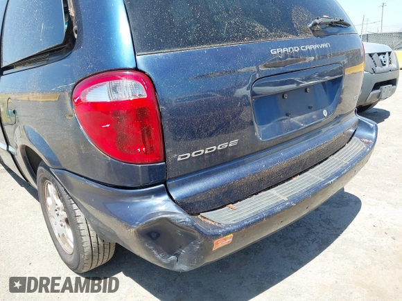 2002 Dodge Caravan EX z VIN 2B8GP74L92R529717, wystawiony jako IAAI lot #42478226 z przebiegiem Nie podano mil oraz . Historia ofert i sprzedaży dostępna na DreamBid. Obrazek 11.
