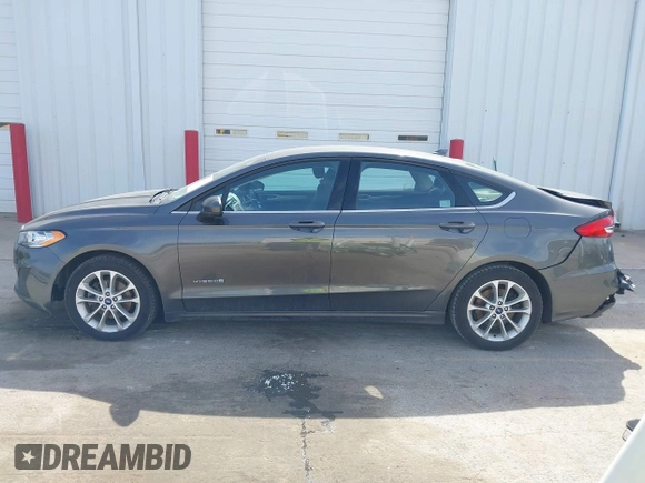 2019 Ford Fusion Hybrid SE with VIN 3FA6P0LU6KR163927, listed as a IAAI auction lot 41834612 with 104,342 mi miles. Bid and sale history available at carsss.com. Image 15.