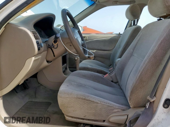 2002 Toyota Corolla CE with VIN 1NXBR12E32Z592708, listed as a Copart auction lot 62866195 with 226,871 mi miles and Clean title. Bid and sale history available at DreamBid. Image 7.