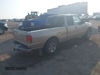 1999 Mazda B-Series 2WD Truck SE with VIN 4F4YR16V0XTM00755, listed as a IAAI auction lot 41530106 with 195,924 mi miles. Bid and sale history available at carsss.com. Image 4.